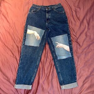 Custom hand-painted boyfriend style jeans, Michelangelo’s Sistine chapel hands